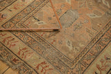Antique Caucasian runner corner showing low pile and tattered geometric patterns.