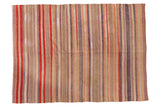 Vintage Turkish Kilim rug with faded red, mauve, blue, and ivory horizontal stripes.