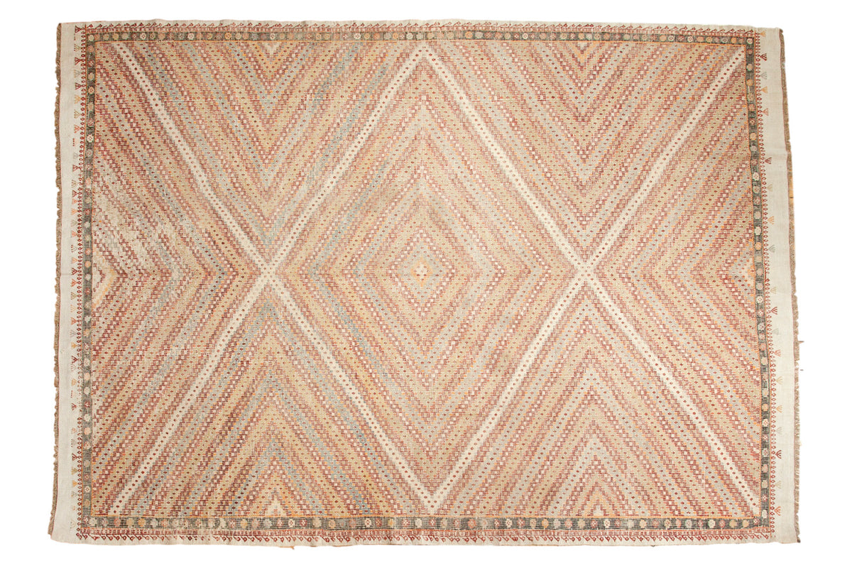 Vintage Turkish Jijim hand-woven carpet with repeating diamond pattern in tangerine, slate blue, ivory.