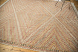 Repeating parallel diamond motif and intricate border on vintage Turkish jijim rug.