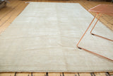 Vintage Turkish Oushak carpet, snow white and pale beige with subtle tone-on-tone texture.