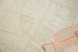 Subtle tone-on-tone coloration on vintage Oushak carpet with visible knot heads.