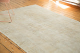 Vintage Oushak carpet pile with subtle snow white and pale beige tones from even wear.