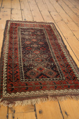 Worn fringe and original goat hair selvage detail on this antique Belouch rug.