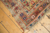 Antique Kurdish Bijar rug corner, circa 1900, showing tattered edge and madder red, sky blue border.