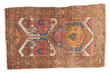 Vintage Persian Lilihan rug with unique multi-panel palmette design and rare blush, saffron, teal tones.
