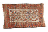 Hand-knotted Vintage Belouch rug, geometric tree of life on ivory, madder red, and blue.