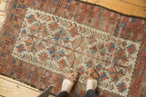 Vintage Belouch rug, geometric tree of life with rare ivory, madder red, and sky blue.