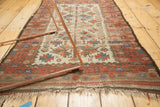 Vintage Belouch rug end: tattered fringe, geometric tree of life pattern, rare ivory field.