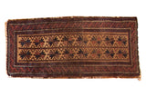 Antique Belouch runner with double column starburst motif in dark camel, navy, and chestnut, 1'5
