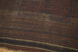 Vintage Belouch carpet end: faded madder red, navy blue, charcoal geometric patterns, striped kilim.