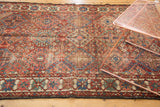 Distressed hand knotted Persian Baktiari diamond pattern in cherry red, sky blue, emerald green.