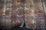Vintage distressed Persian Yezd carpet with rare purple plum and mallard green field.