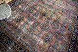 Distressed pile texture showing rare purple plum, bronze, and teal floral vase motifs.