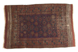 Antique Belouch carpet, traditional allover design in navy, madder red, and rich browns, 5'9