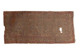 Antique camel hair runner; allover pomegranate design; natural camel, blue, red tones; large hole.
