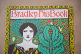Close-up of William Bradley's lithograph poster showing a woman, green foliage, and 