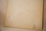 Back of vintage oil on board, light brown, handwritten Melvin Sapley.
