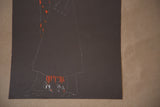 Lower art deco lithograph detail with dotted figures and dramatic orange illumination.