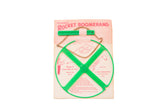 Mid Century Pearson's Rocket Boomerang toy, green plastic, in original packaging.