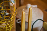 Pair of natural beeswax square taper candles, 12 inches tall with wicks.
