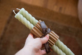 Pair of celadon rope taper candles, 10 inches tall.
