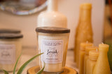 Clear glass vintage jelly jar candle with 'Fresh Scent' label and textured rusty zinc lid.