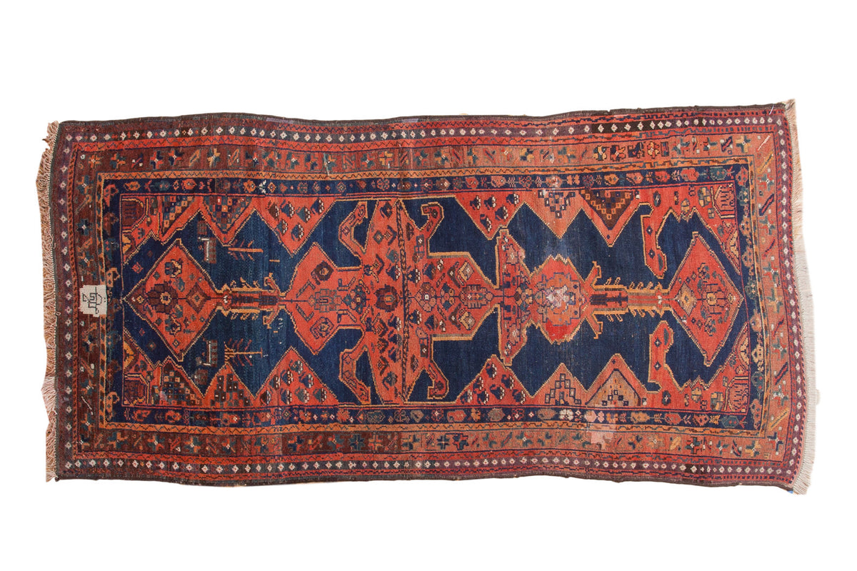 Bold vintage Kurdish rug with dramatic multi-medallion pattern in indigo blue, madder red, ivory, 4x8.