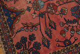 Blossoming florals and vinery on faded cranberry field, revealing intricate border patterns.