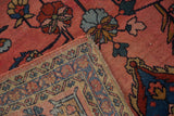 Vintage Persian Lilihan rug corner, with faded cranberry florals and intricately banded borders.