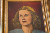 Mid-century portrait detail showing the bright-eyed woman with red lips and golden frame.