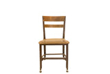 Vintage Toledo kid's school chair featuring warm aged wood seat, slatted back, and a dark metal frame.