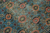 Antique Lilihan rug's Veramin floral lattice with sky blue and madder red, showing wear.