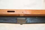 Universal Winding Co. patent plaque on the dark reclaimed iron base of the industrial counter.