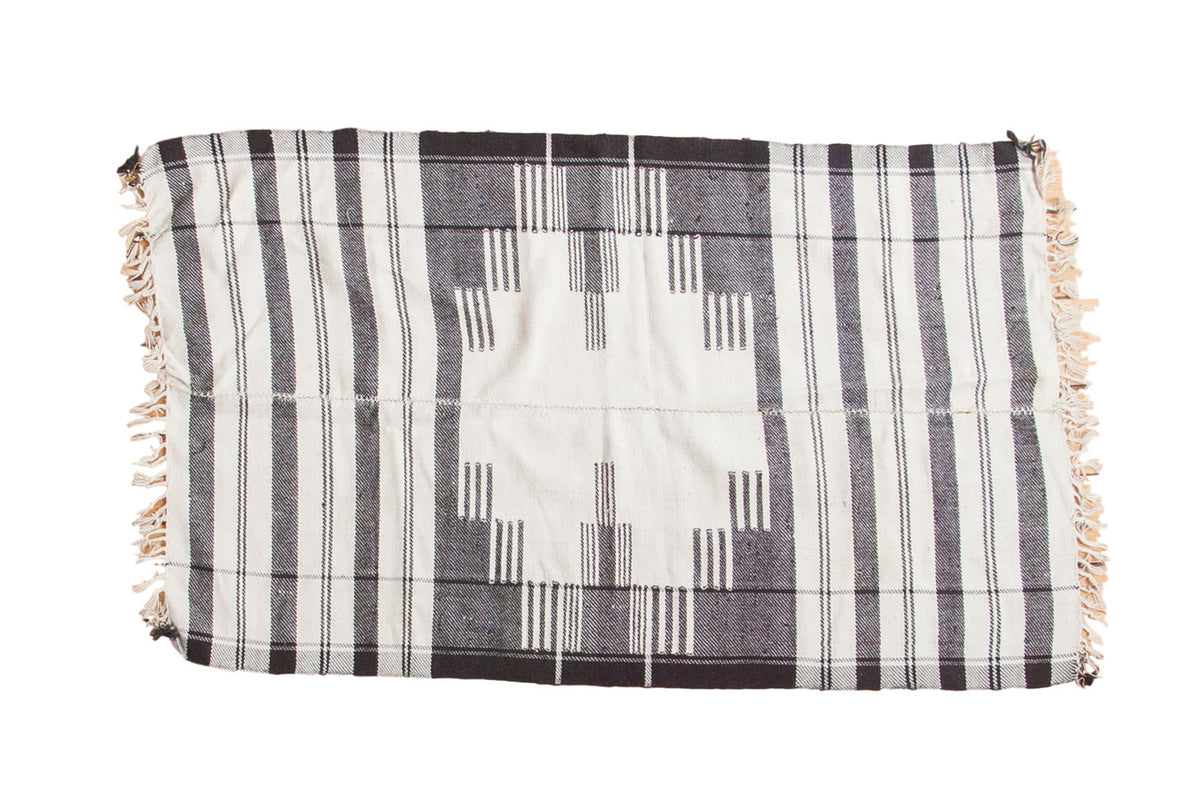 Hand knotted vintage Kurdish throw rug with ivory, black stripes and geometric medallion.
