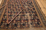 Allover navy boteh paisley pattern with vinery on a vintage Persian Hamadan rug, showing foundation.