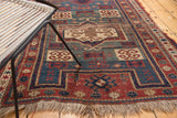 Antique Fachralo Kazak rug with rams horn medallion, geometric brick red and teal patterns, worn texture.