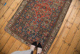Hand-knotted vintage Hamadan fragment: diamond medallion, allover Herati motif.