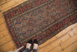Distressed geometric tree of life pattern with foundation showing; blush, blue, red hues.