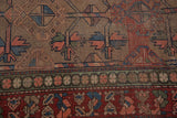 Vintage Kurdish Hamadan rug detail: geometric tree-of-life motif and worn red border.