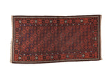 Vintage Afghan rug with repeating gul motif, lattice pattern, crab border, brick red, charcoal, and navy.
