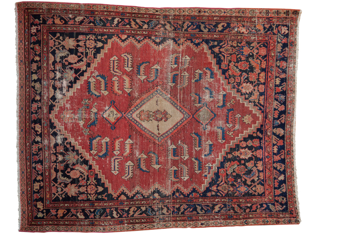 Distressed early 20th century Persian Malayer rug with cinnabar red and dark Herati pattern.