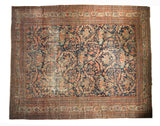 Antique Persian Mustafi Mahal carpet with allover floral and animal design in cobalt blue and terra cotta, circa 1920s.