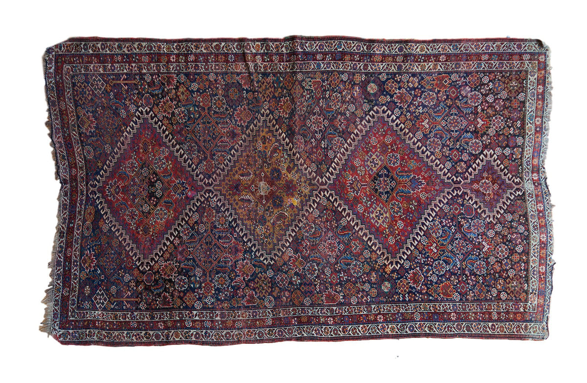 Antique Fine Qashqai rug with triple diamond medallions and madder red, indigo field. Circa 1900.