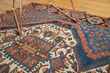 Intricate Afshar rug geometric patterns with boteh in indigo, sky blue, and madder root rust.