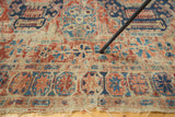 Antique Soumac rug's intricate geometric patterns with exposed foundation and tattered end.