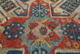 Antique Persian Soumac rug with vivid geometric eagle motifs, naturally worn pile, exposed foundation.