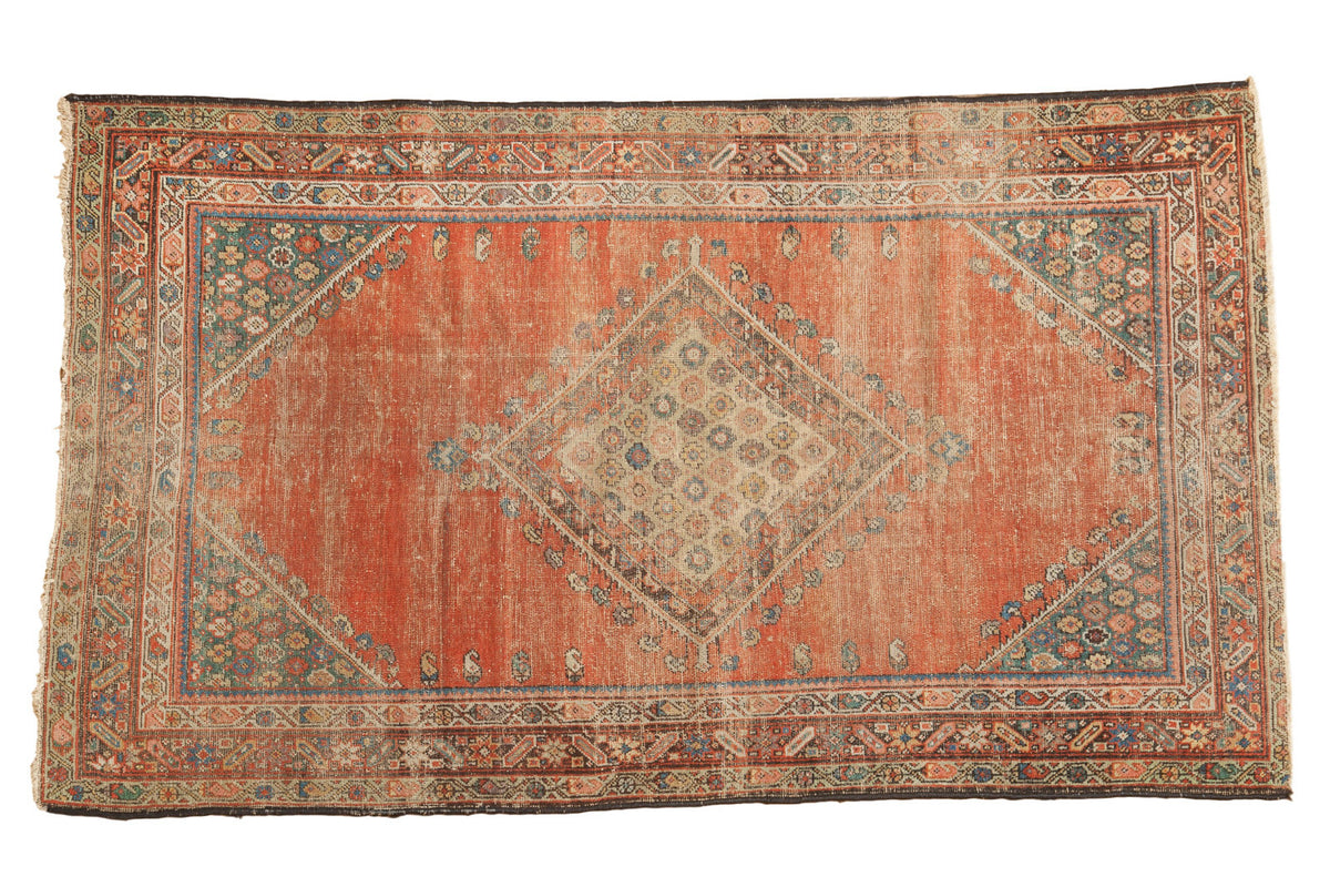 Antique Persian Fereghan rug: blush peach rose field, diamond medallion, detailed borders, 3'7" x 6'1".