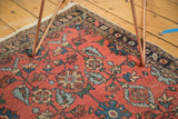 Hand-knotted vintage Lilihan rug with serrated leaves, budding blossoms in cinnabar red, powder blue.