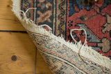 Lilihan rug's intricate hand-knotted foundation weave and light tattered side.